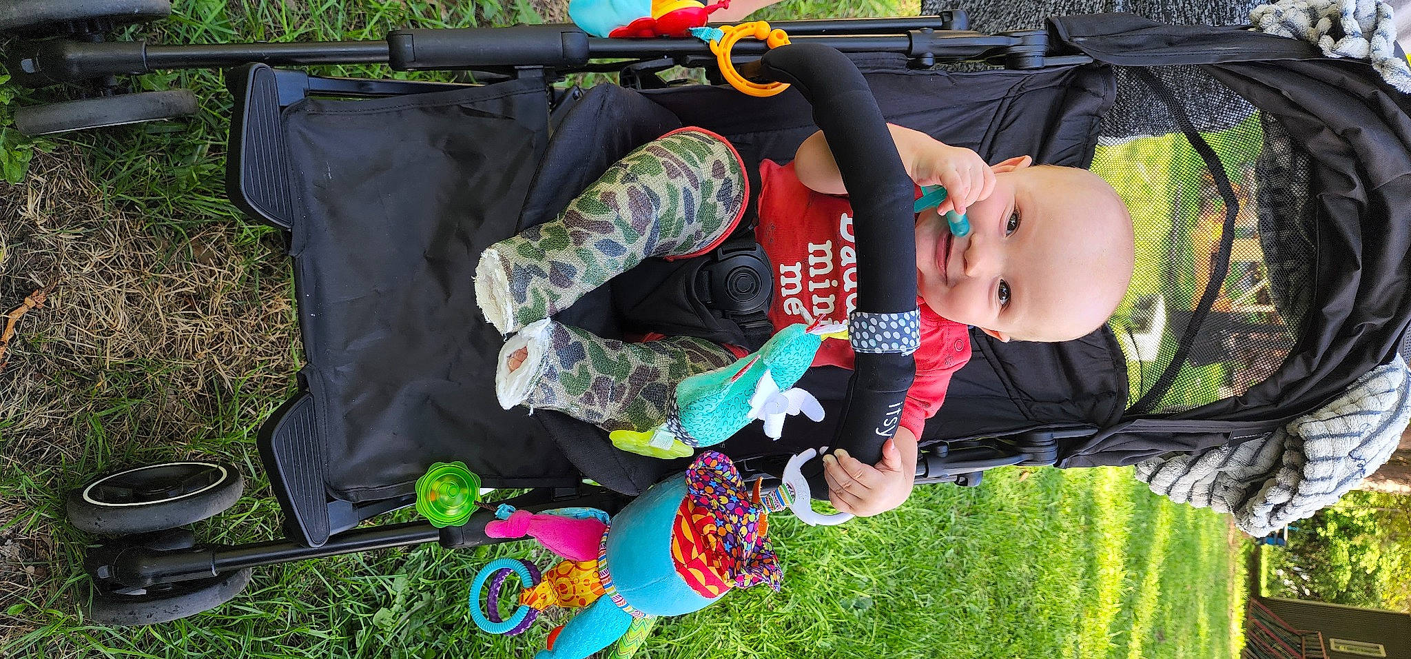 Reid joined the competition — help win amazing prizes! automotive_exterior, baby, baby_products, child, event, fun, grass, green, happy, hat, leisure, person, personal_protective_equipment, plant, play, product, recreation, shooting, t_shirt, toddler