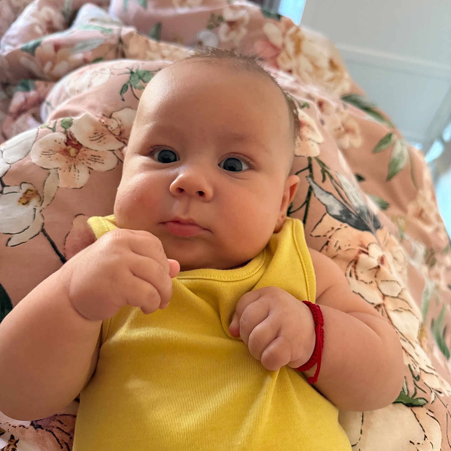 Mattyas joined the competition — help win amazing prizes! baby, blanket, bracelet, child, closeup, comfort, curious, cute, face, floral_pattern, hands, indoor, infant, person, portrait, resting, skin, soft_lighting, wrists, yellow_clothing