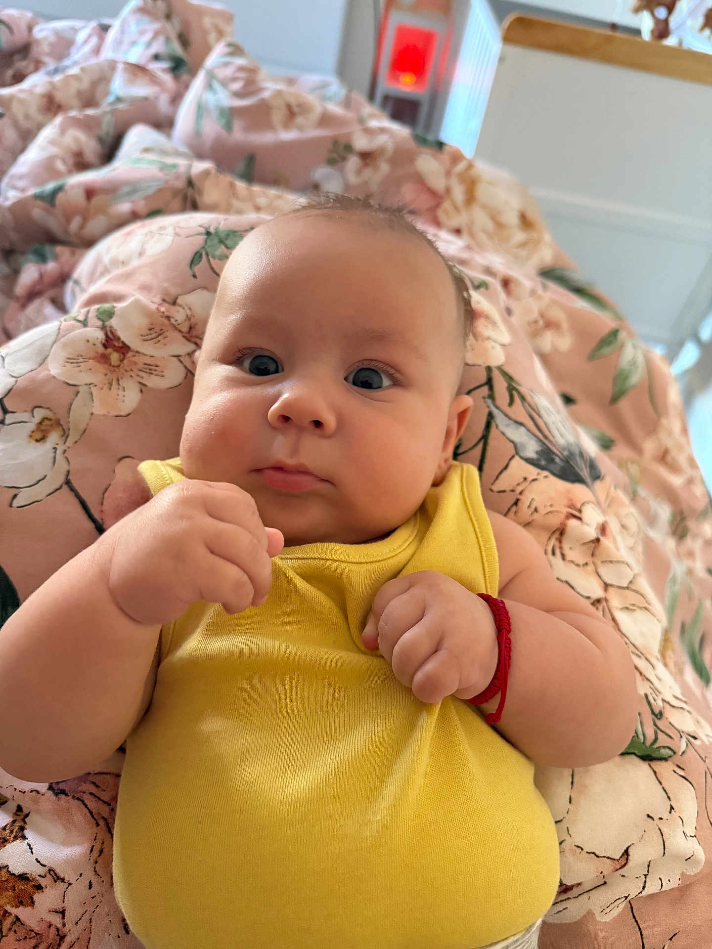 Mattyas joined the competition — help win amazing prizes! baby, blanket, bracelet, child, closeup, comfort, curious, cute, face, floral_pattern, hands, indoor, infant, person, portrait, resting, skin, soft_lighting, wrists, yellow_clothing