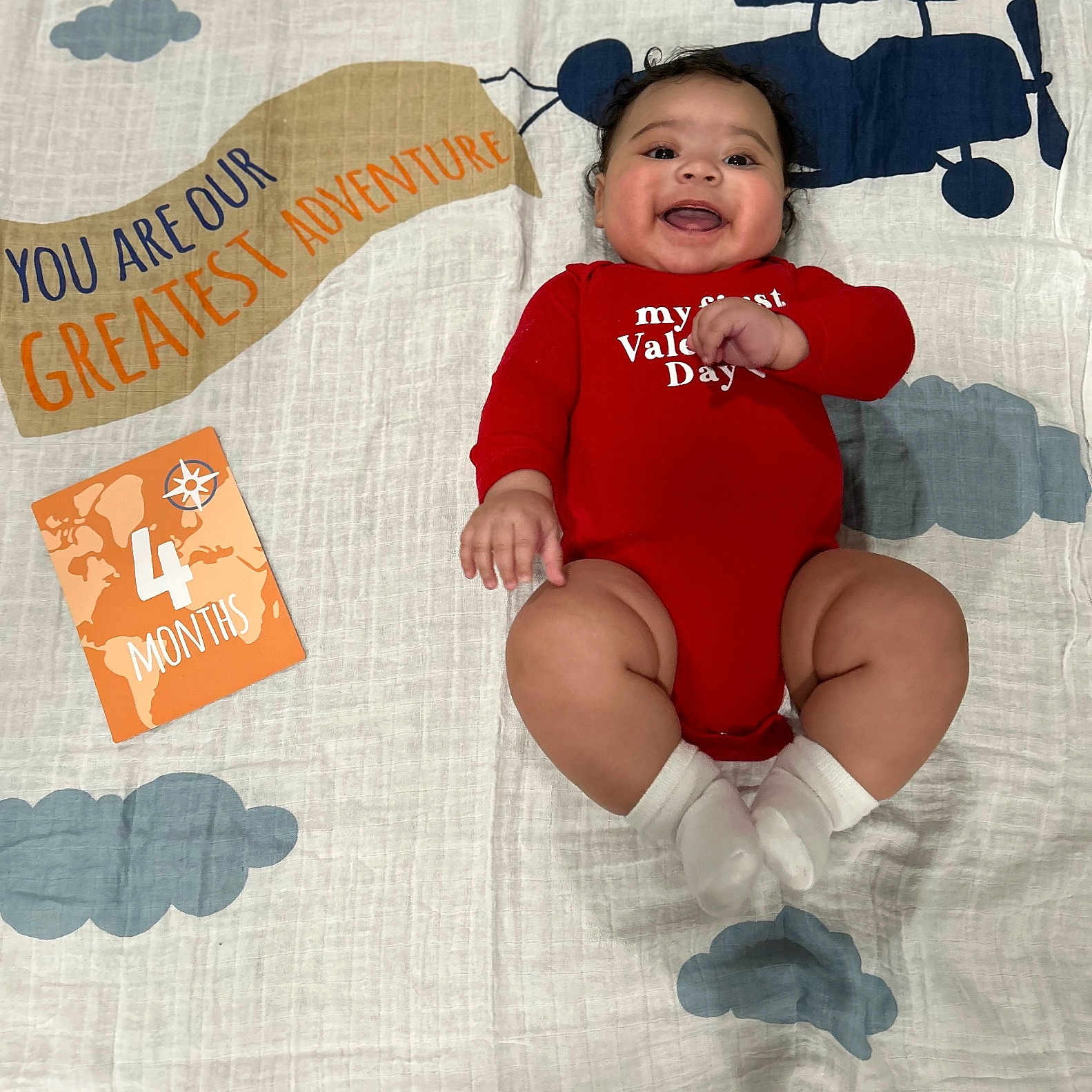 Elijah joined the competition — help win amazing prizes! baby, babylaughing, bodypart, clothing, face, finger, furniture, hand, happy, head, homedecor, hosiery, laughing, person, photography, portrait, sitting, smile, sock, t_shirt