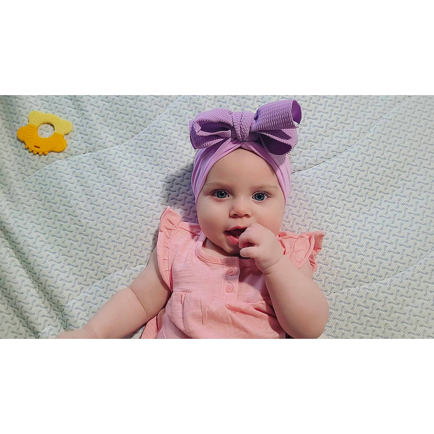 Parker is registered to the contest to win money with this photo: baby, baby_toddler_clothing, cap, costume_hat, crown, fashion_accessory, font, hair_accessory, happy, headband, headpiece, headwear, knit_cap, magenta, pattern, person, pink, purple, sleeve, thumb