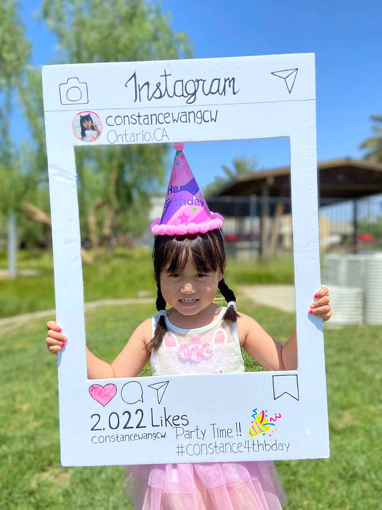 Constance joined the competition — help win amazing prizes! art, blurred, font, grass, happy, leisure, magenta, mammal, party_hat, party_supply, person, photograph, pink, plant, poster, public_space, recreation, sky, summer, toddler