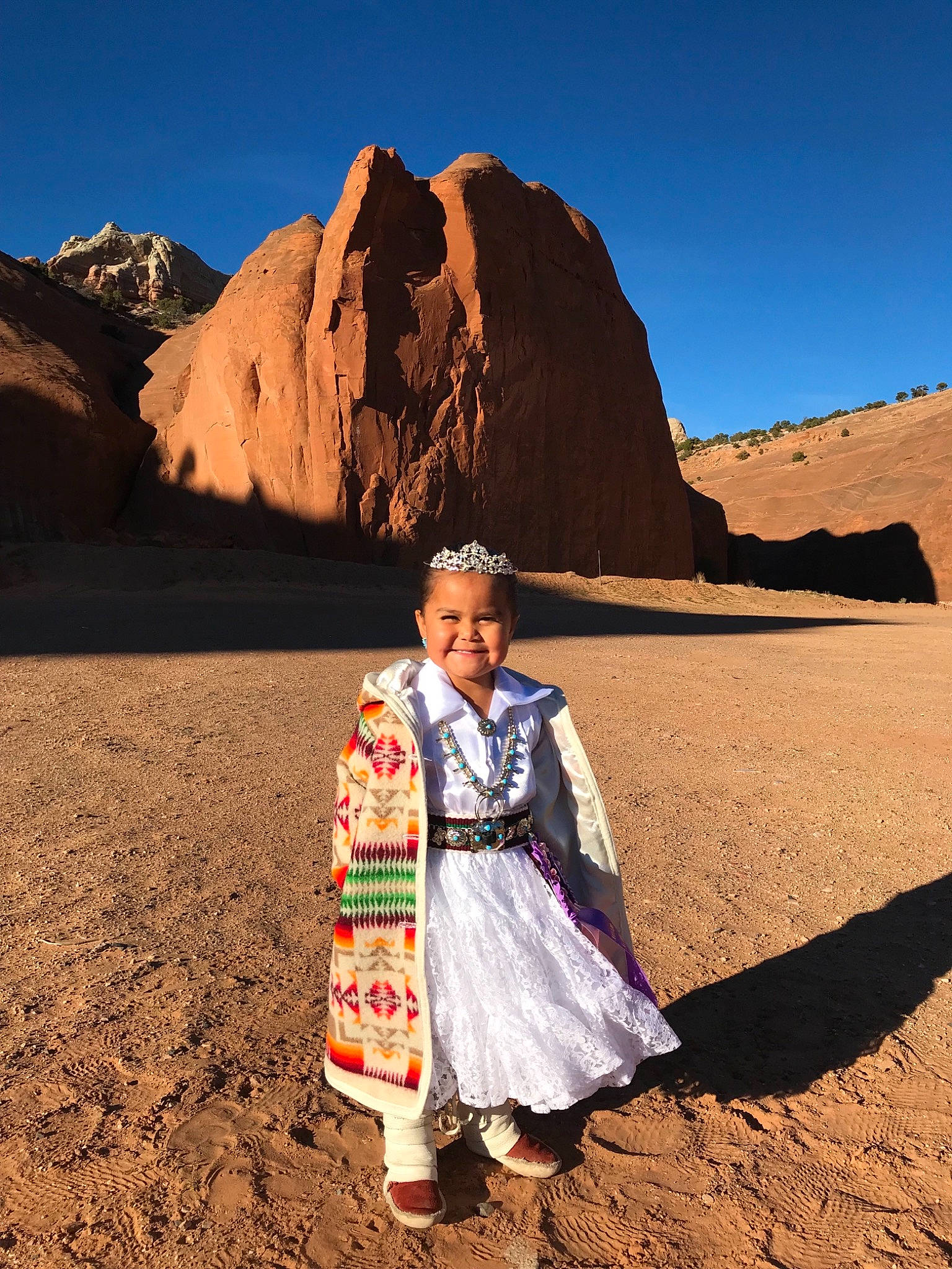 Melissa is registered to the contest to win money with this photo: adaptation, aeolian_landform, badlands, desert, ecoregion, fawn, geology, joy, landscape, mountain, mountainous_landforms, natural_environment, person, rock, sahara, sky, stock_photography, tints_and_shades, tourism, travel