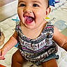 baby, child, smiling, happy, sitting, play_mat, indoor, patterned_clothing, denim_shorts, cute, face, portrait, infant, bright, eyes, skin, person, young_child, cheerful, expression