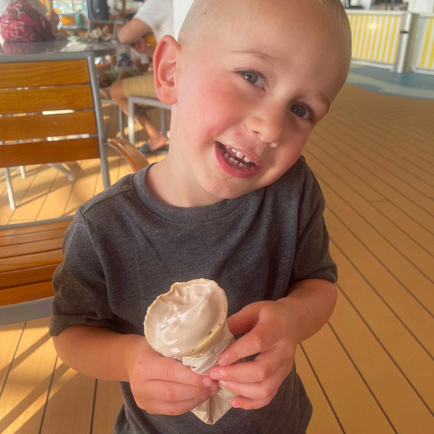 Atticus joined the competition — help win amazing prizes! adult, baby, bodypart, clothing, cream, dessert, face, finger, food, hardwood, hat, head, icecream, icing, male, man, person, photography, portrait, wood