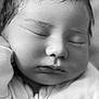 baby, newborn, sleeping, face, infant, black_and_white, portrait, closeup, soft_skin, wet_hair, peaceful, child, cozy, zipper, clothing, cute, resting, young, person, toddler