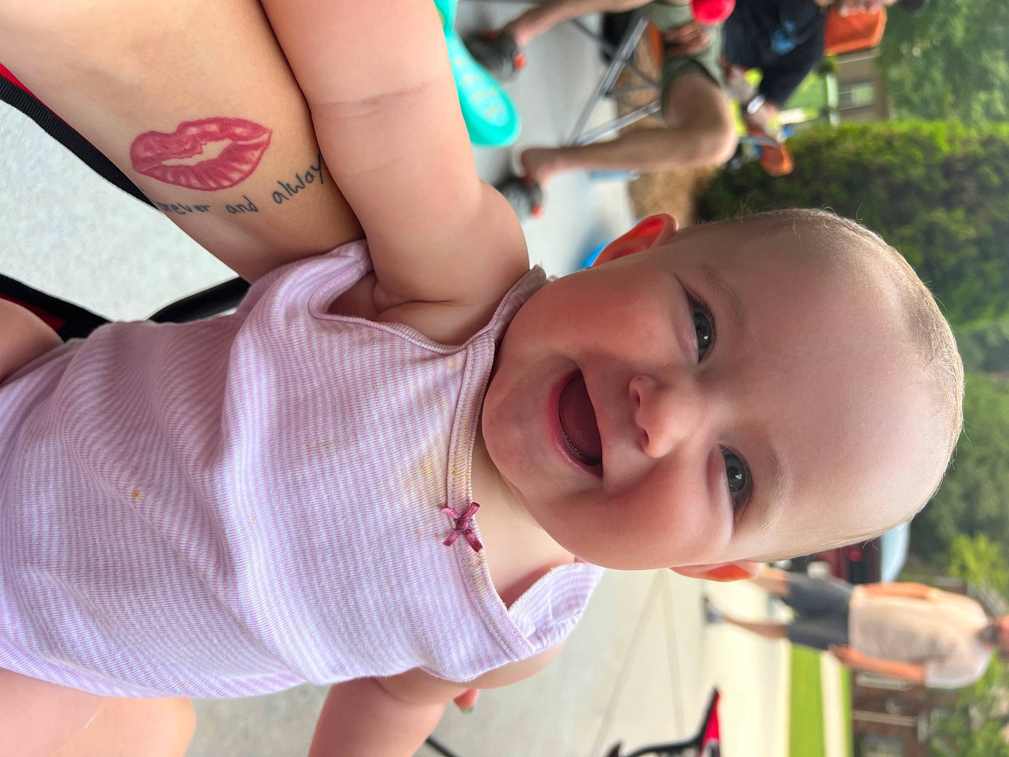 Caroline joined the competition — help win amazing prizes! baby, baby_toddler_clothing, finger, grass, happy, joy, leisure, lip, mouth, neck, nose, organ, person, pink, plant, skin, smile, summer, temporary_tattoo, toddler