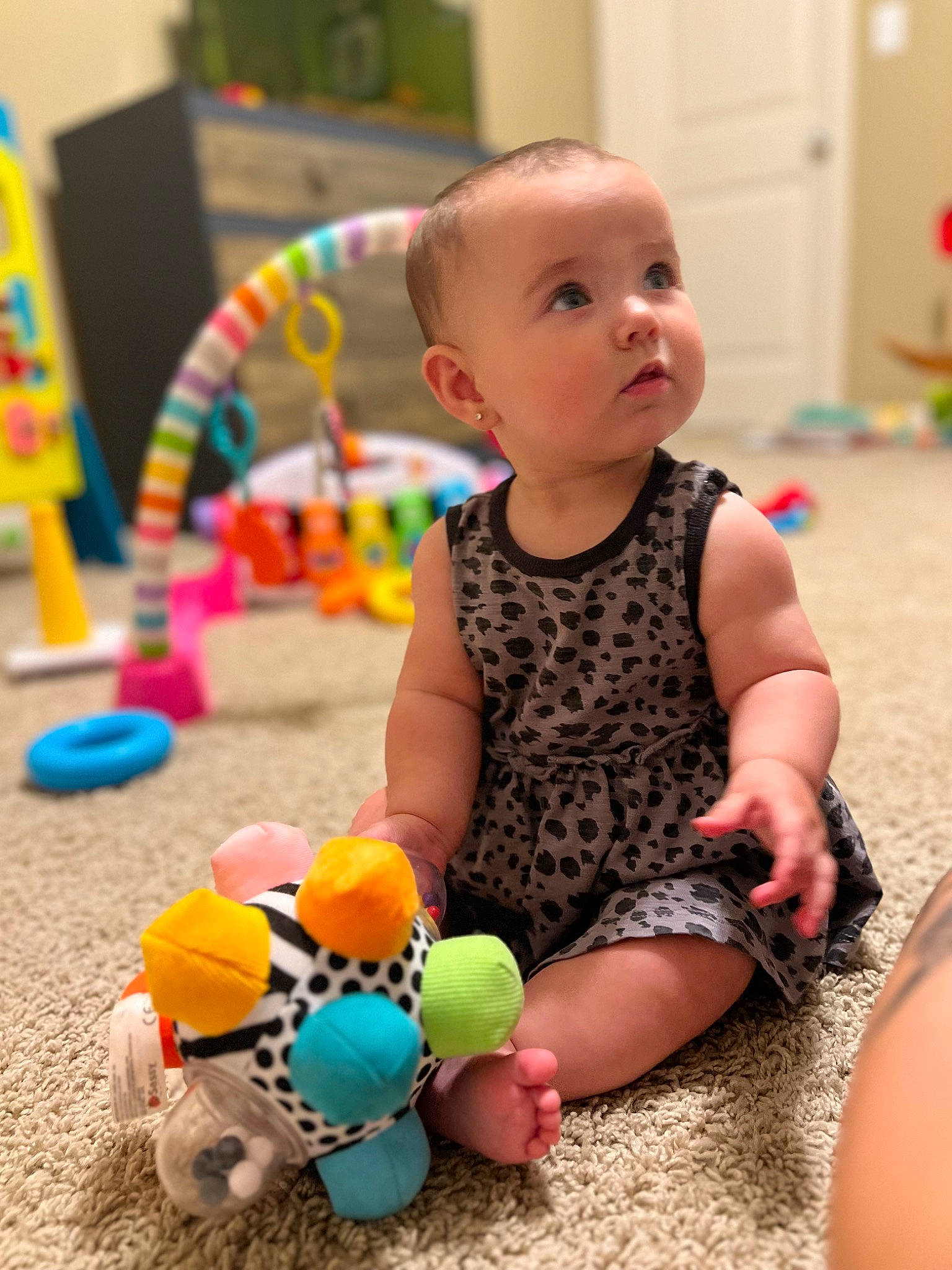 Caroline is registered to the contest to win money with this photo: baby, baby_playing_with_toys, baby_toddler_clothing, baby_toys, child, facial_expression, fun, happy, leisure, pattern, people, person, photograph, play, sitting, skin, snapshot, summer, toddler, toy
