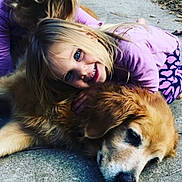 Audrey is registered to the contest to win money with this photo: brown_hair, carnivore, child, companion_dog, dog, dog_breed, fawn, fun, fur, grass, hair, happy, leisure, long_hair, plant, selfie, sitting, sporting_group, tree, whiskers