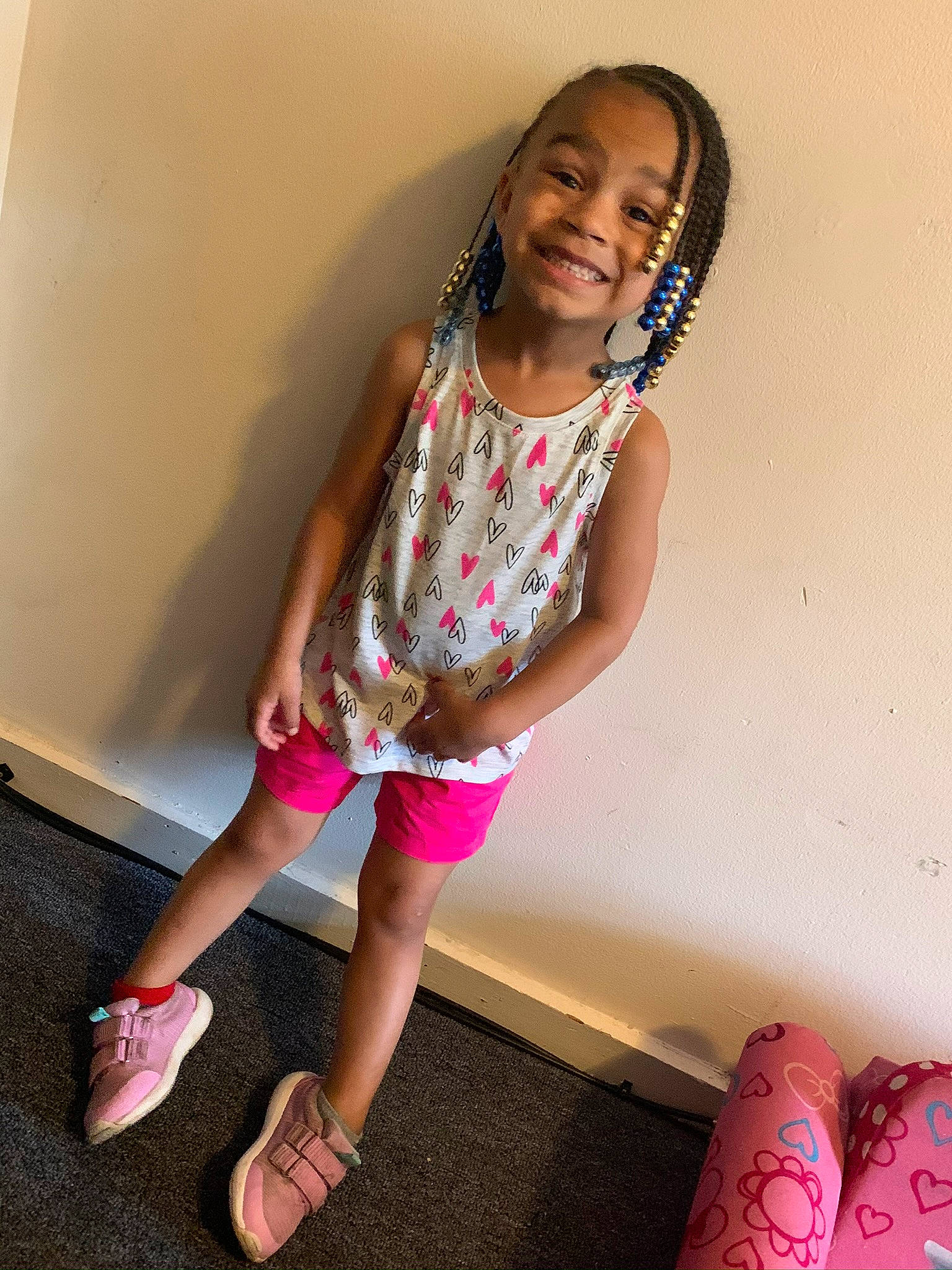 Janelle is registered to the contest to win money with this photo: child, child_model, foot, happy, human_leg, joy, leg, long_hair, magenta, person, photo_shoot, pink, sitting, skin, smile, t_shirt, thigh, toddler