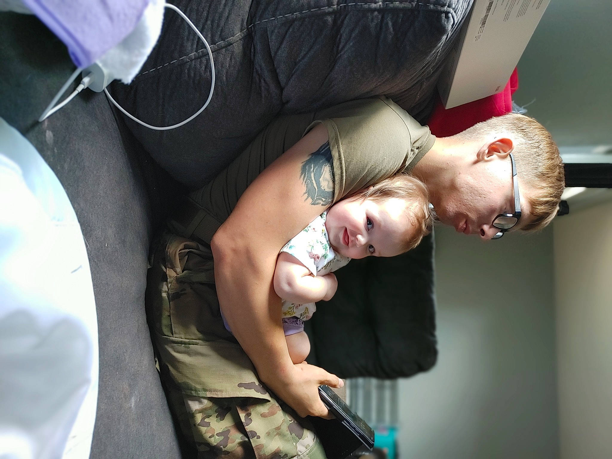 Rylah is registered to the contest to win money with this photo: army, child, comfort, elbow, event, eyewear, flash_photography, fun, gesture, glasses, joint, marines, military, military_person, military_uniform, non_commissioned_officer, person, shoulder, sitting, soldier