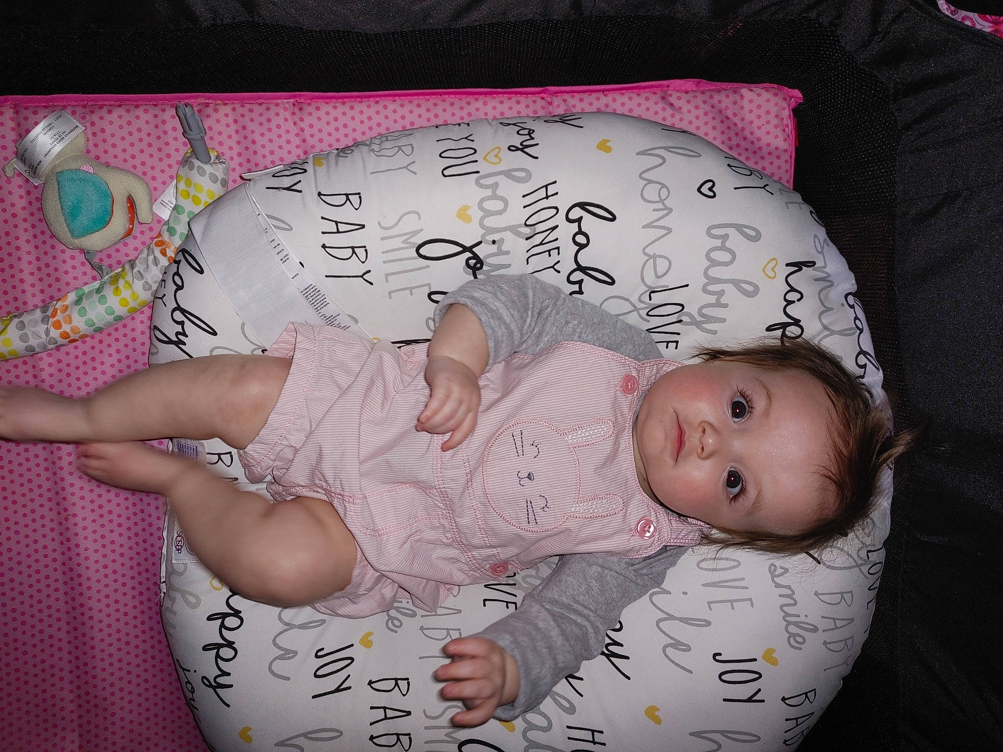 Rylah is registered to the contest to win money with this photo: baby, baby_carriage, baby_products, baby_sleeping, baby_toddler_clothing, cheek, child, comfort, hand, lap, linens, nap, pattern, person, pink, product, room, sleep, sleeve, textile