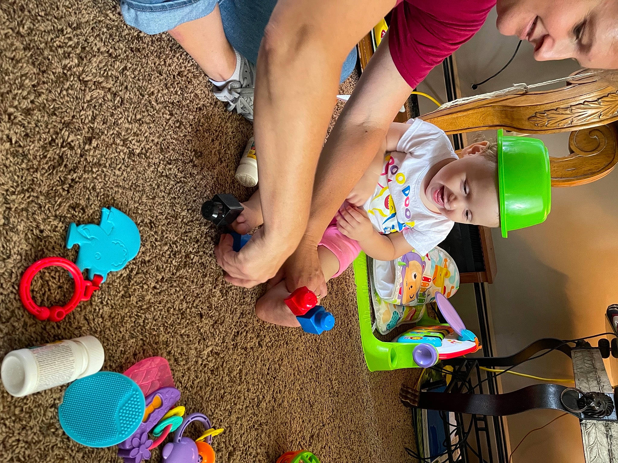Lacey is registered to the contest to win money with this photo: blue, child, fun, grass, green, happy, headwear, joy, leg, leisure, light, person, product, public_space, shoe, shorts, sneakers, summer, tire, toddler