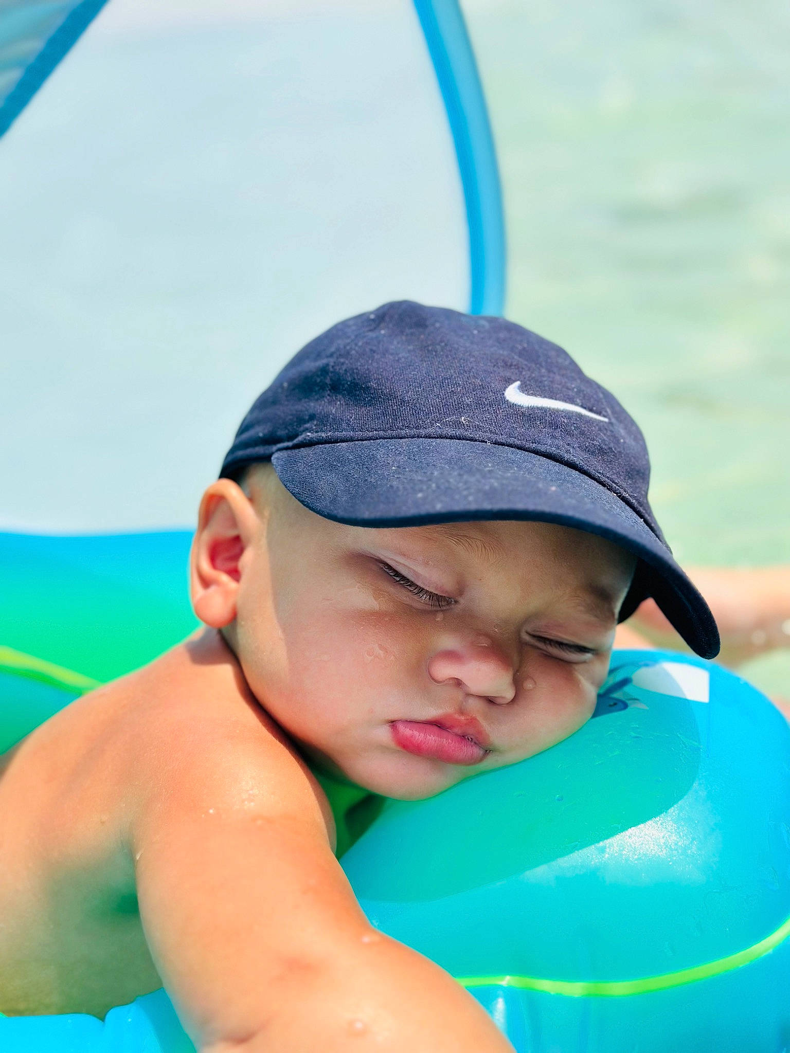 Braison is registered to the contest to win money with this photo: aqua, azure, baseball_cap, blue, cap, chest, child, competition_event, electric_blue, face, fun, happy, headwear, inflatable, leisure, muscle, person, personal_protective_equipment, recreation, sports