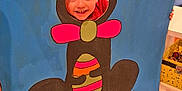Lucas participe au concours pour gagner de l'argent avec cette photo : child, smile, face, bunny, cutout, colorful, playful, easter, egg, decoration, indoor, happy, young, fun, costume, art, painting, board, toy, background