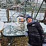 Gabriel a rejoint le concours — aidez-le/la à gagner de superbes lots ! child, snowman, snow, winter, scarf, hat, gloves, jacket, outdoor, table, carrot, smile, face, fence, brick, snowy, cold, play, happy, nature