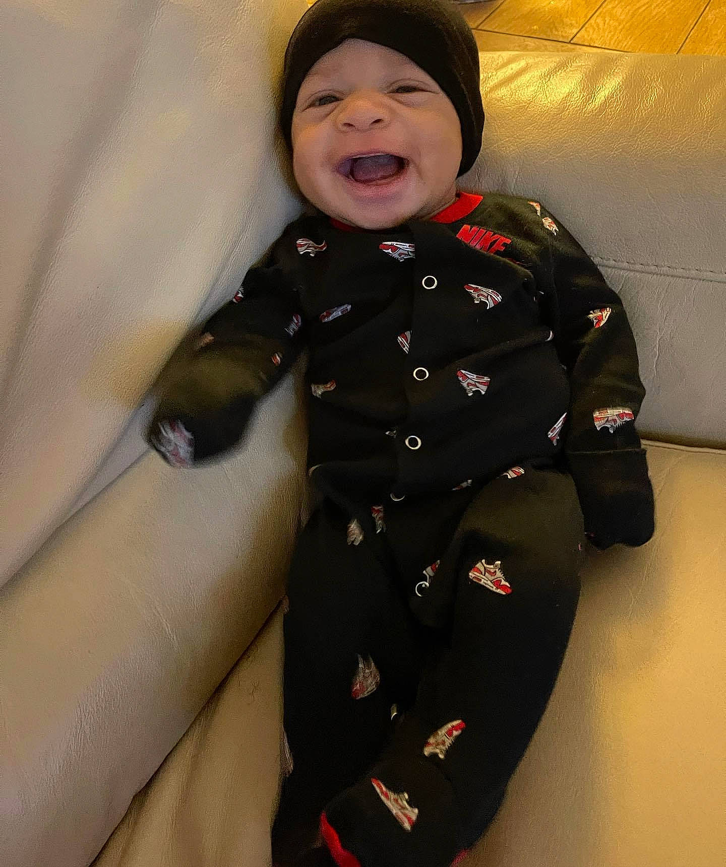 Kristian is registered to the contest to win money with this photo: baby_toddler_clothing, blazer, button, collar, comfort, face, formal_wear, gesture, happy, headwear, jacket, military_person, military_uniform, outerwear, overcoat, pattern, person, sleeve, smile, toddler