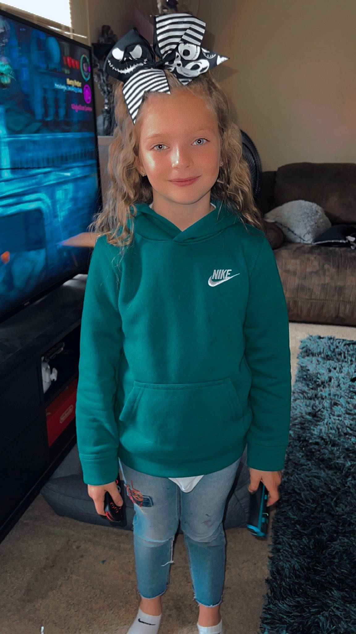 Delanie joined the competition — help win amazing prizes! blue, child, cool, electric_blue, event, eye, face, fun, hair, happy, head, joy, person, personal_protective_equipment, pink, sleeve, smile, sportswear, sweatpant, t_shirt