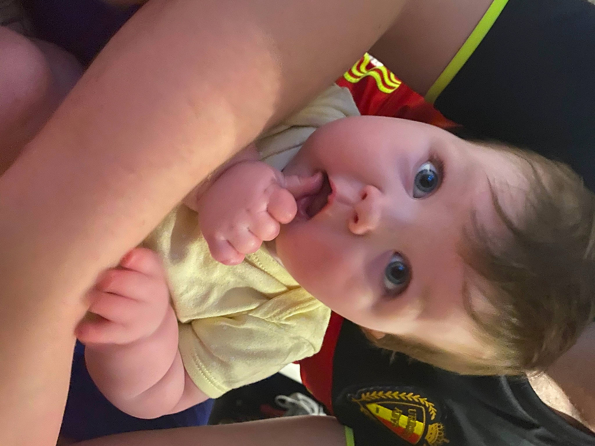 Lara is registered to the contest to win money with this photo: arm, baby, cheek, child, ear, eye, face, finger, forehead, hand, head, lip, mouth, muscle, nail, neck, nose, person, skin, surprise