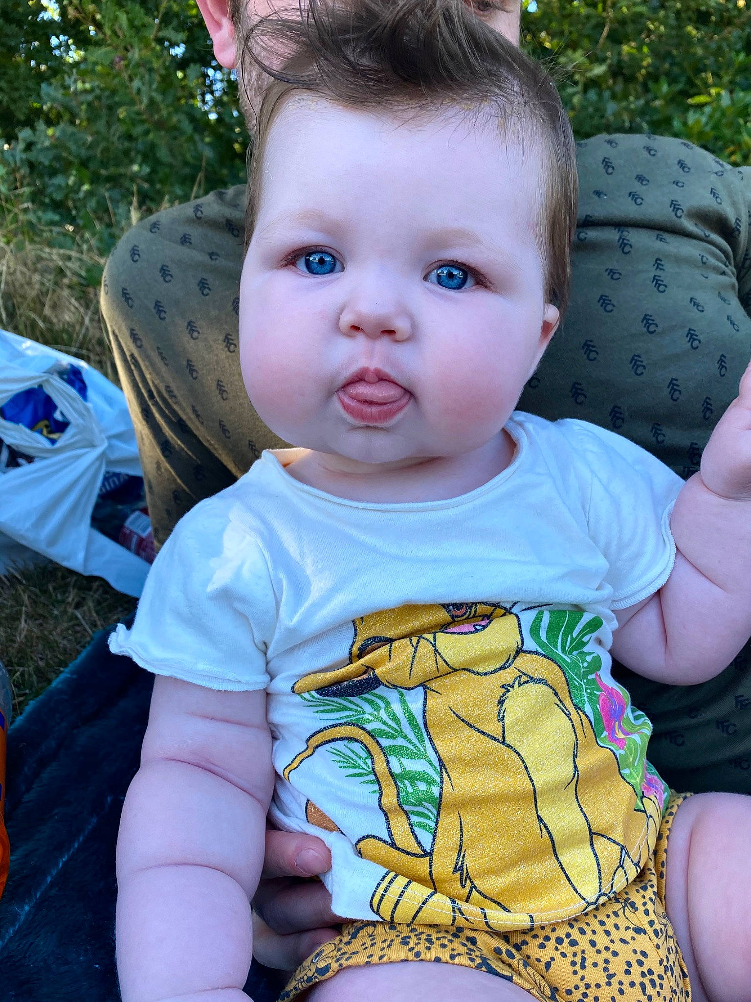 Lara joined the competition — help win amazing prizes! baby, baby_toddler_clothing, beauty, cheek, child, eye, face, grass, hand, head, iris, leaf, lip, people, person, sitting, skin, summer, toddler, tree