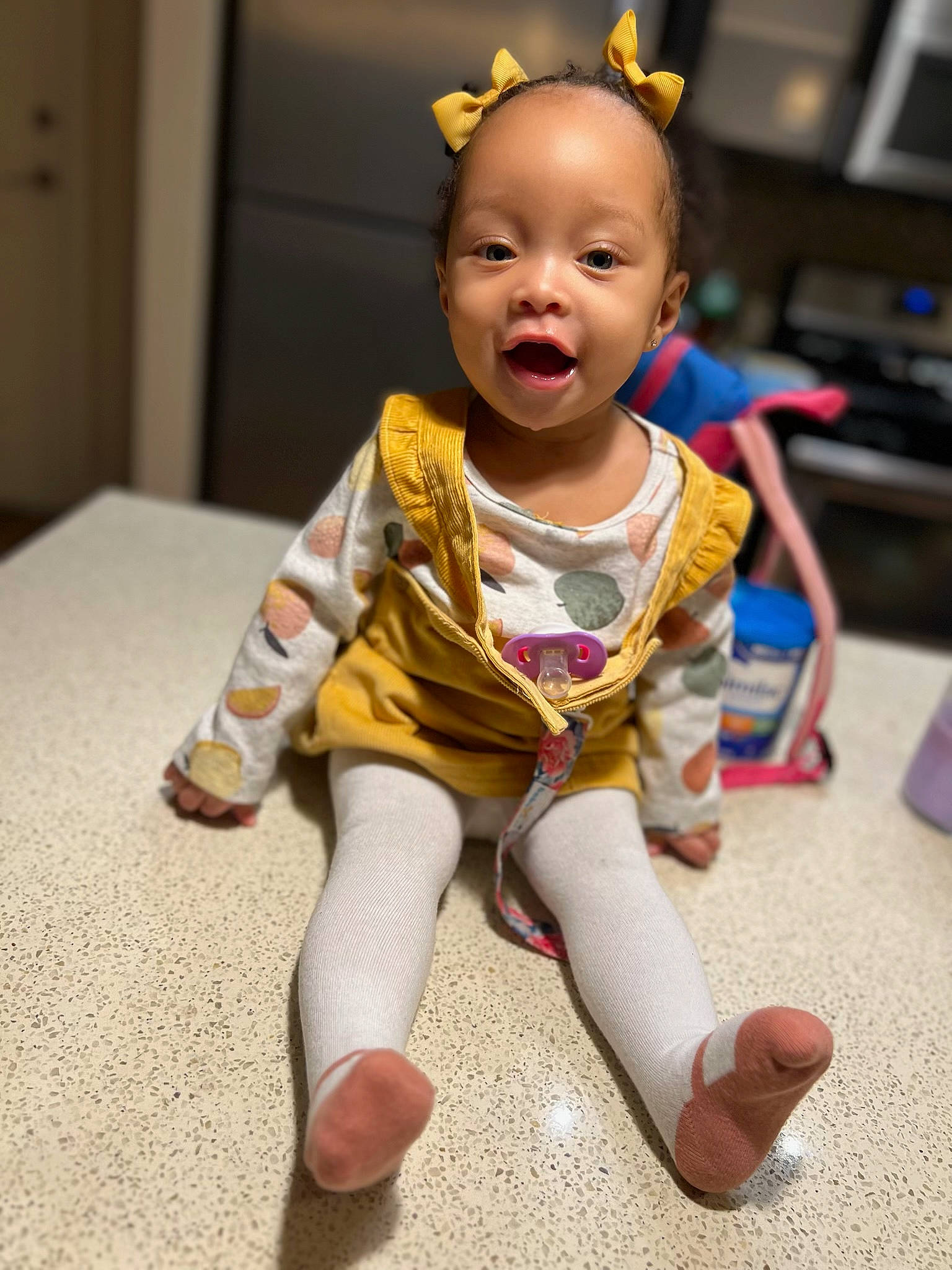Kali joined the competition — help win amazing prizes! baby, baby_toddler_clothing, cheek, child, event, floor, flooring, foot, fun, happy, human_leg, person, room, sitting, skin, sleeve, smile, toddler