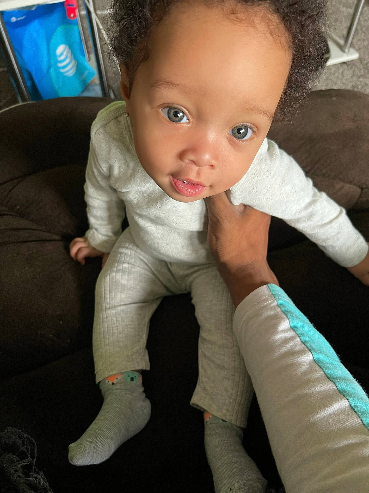 Kali is registered to the contest to win money with this photo: baby, baby_toddler_clothing, cheek, chest, comfort, elbow, eye, eyebrow, eyelash, finger, gesture, head, iris, leg, lip, neck, nose, person, sleeve, thumb