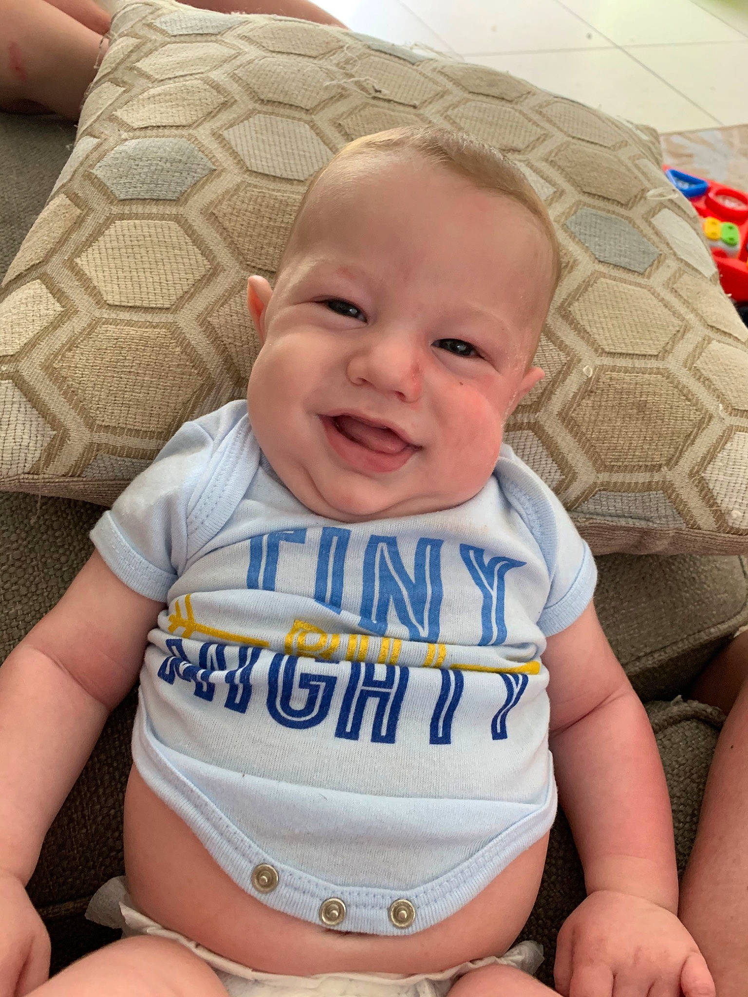 Nash joined the competition — help win amazing prizes! abdomen, baby, baby_products, baby_toddler_clothing, cheek, child, facial_expression, head, person, sitting, skin, smile, toddler