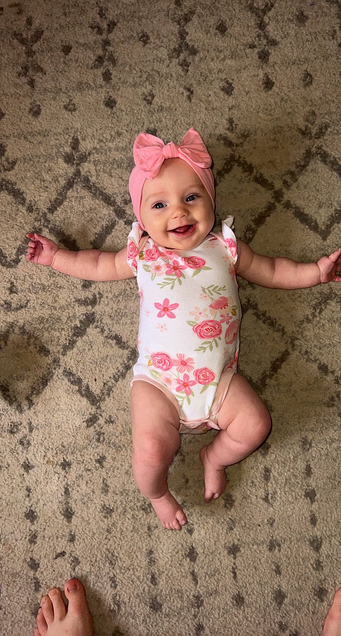 Wrenly joined the competition — help win amazing prizes! baby, baby_toddler_clothing, barefoot, finger, foot, fun, gesture, grass, happy, headgear, headwear, human_leg, joy, leg, pattern, person, pink, skin, sleeve, smile