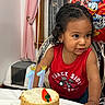Cairo Rosario joined the competition — help win amazing prizes! child, toddler, birthday_cake, candles, red_shirt, indoor, balloon, happy_birthday, curly_hair, table, window, pink_curtain, celebration, cake, food, person, face, hands, party, decorations
