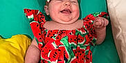 Blakely is registered to the contest to win money with this photo: architecture, baby, babylaughing, clothing, couch, cushion, dress, face, furniture, happy, head, homedecor, laughing, newborn, person, photography, pillow, portrait, quilt, smile