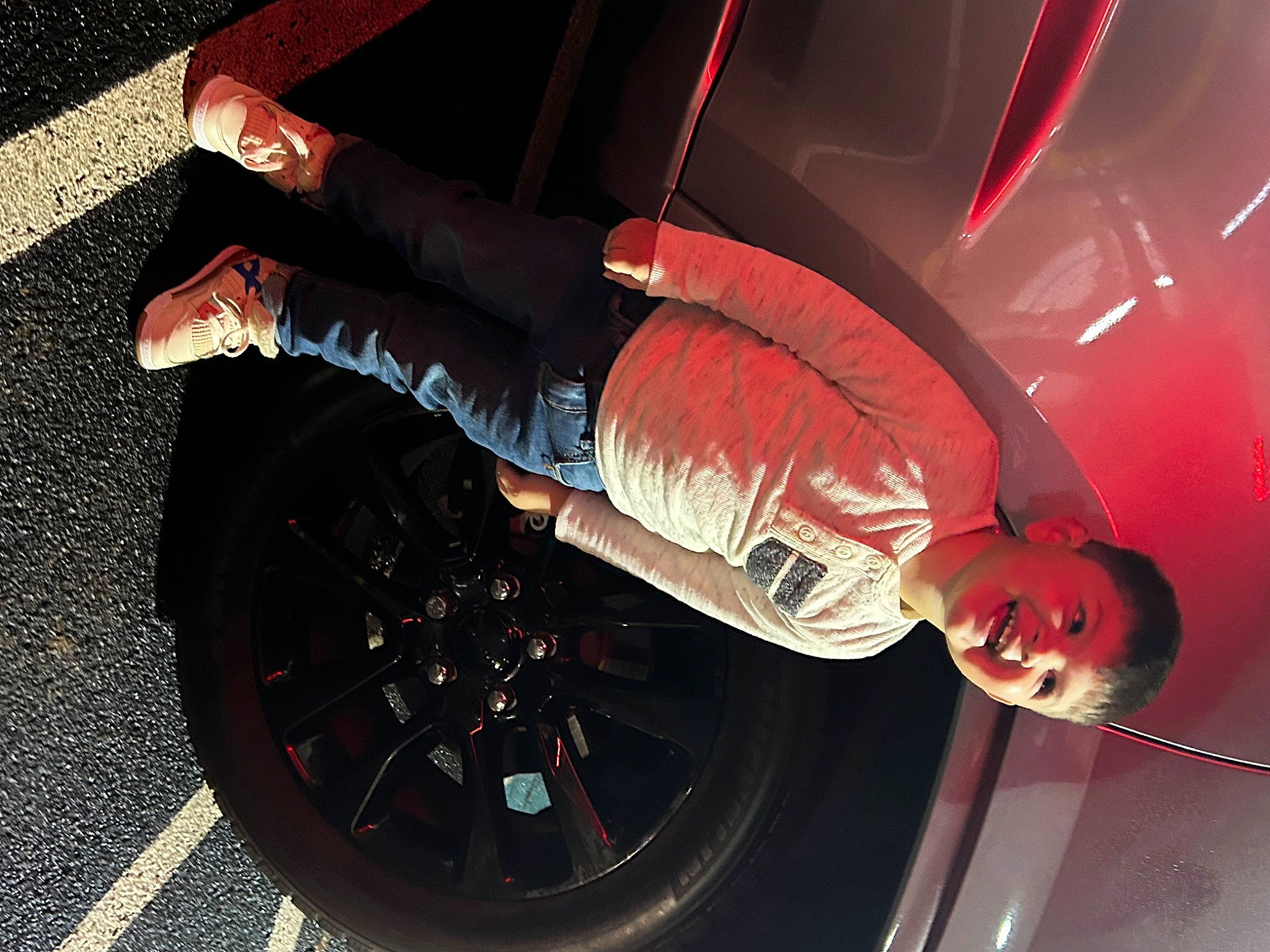 Julian joined the competition — help win amazing prizes! alloy_wheel, automotive_design, automotive_exterior, automotive_lighting, automotive_tire, bumper, car, flash_photography, hood, hubcap, human_body, land_vehicle, leg, motor_vehicle, person, rim, tire, vehicle, vehicle_door, wheel