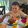 child, boy, birthday, cake, candle, chocolate, table, colorful, party, smile, indoors, window, chair, curtains, plate, celebration, happy, haircut, kitchen, decorations