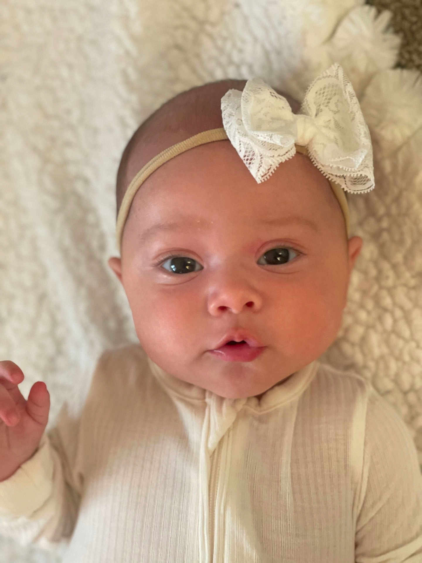 Poet joined the competition — help win amazing prizes! baby, infant, face, headband, bow, eyes, expression, clothing, blanket, texture, portrait, cute, child, newborn, soft, skin, hand, laying, indoors, closeup