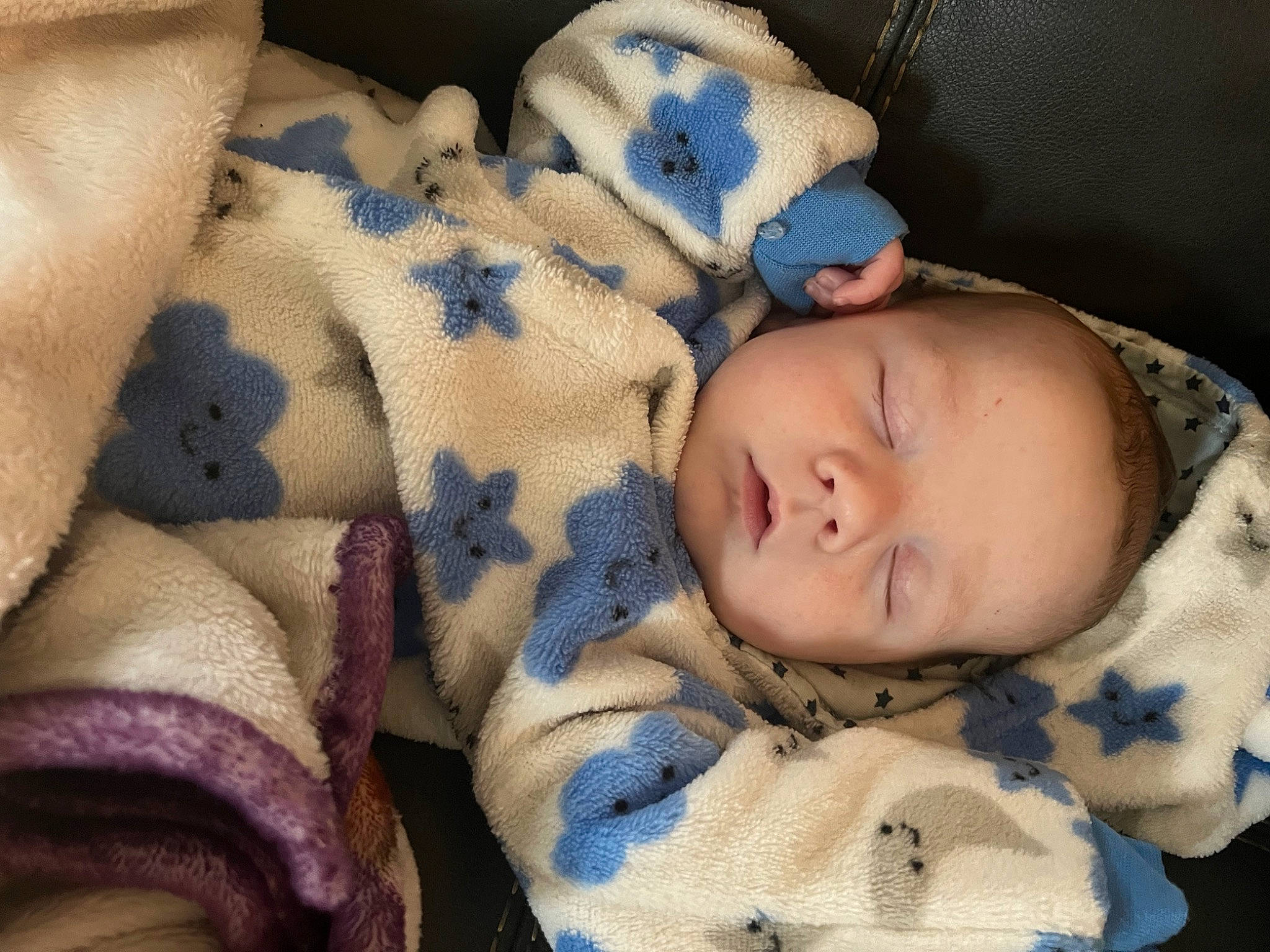 Wyatt is registered to the contest to win money with this photo: baby, baby_sleeping, baby_toddler_clothing, bedtime, cheek, child, comfort, eye, face, fur, head, linens, mammal, nap, pattern, person, skin, sleeve, textile, toddler