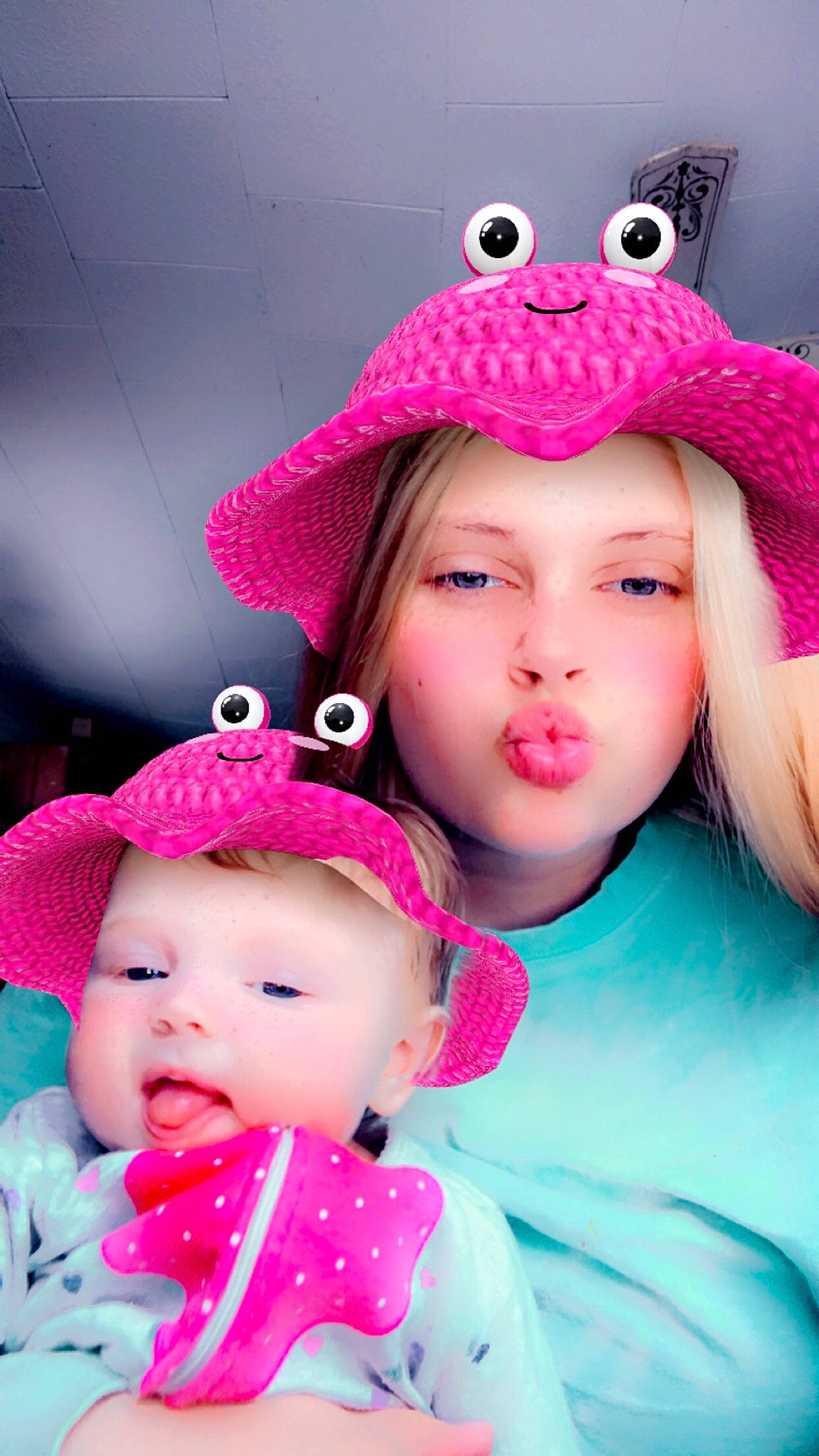 Georgia is registered to the contest to win money with this photo: baby, baby_toddler_clothing, cap, cheek, chin, costume_hat, face, fun, happy, headgear, headwear, lip, magenta, organ, person, photograph, pink, purple, skin, sleeve