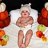 baby, infant, diaper, knit_hat, blanket, pumpkin, knitted_pumpkin, autumn_leaves, fall, cute, chubby, blue_eyes, smiling, lying_down, cozy, soft_texture, child, seasonal, holiday, cute_hat