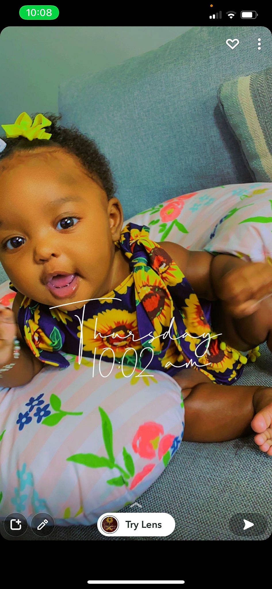Kamari is registered to the contest to win money with this photo: baby_toddler_clothing, cheek, chin, dress, eye, eyelash, face, finger, fun, green, happy, head, human_body, iris, mouth, person, pink, skin, sleeve, textile