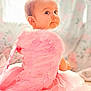 adorable, angel, baby, child, costume, cute, decor, fairy_tale, feather_wings, fluffy, gazing, indoors, infant, pastel_colors, pink_dress, portrait, sitting, soft_lighting, soft_texture, young