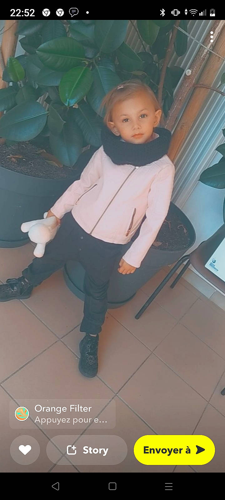 Naya participe au concours pour gagner de l'argent avec cette photo : black_hair, boot, child, costume, doll, eyewear, fashion_design, flooring, foot, fun, human_leg, knee, pattern, person, plant, room, sandal, sitting, thigh, toy