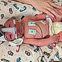 newborn, baby, hospital, medical_equipment, breathing_mask, monitoring_wires, hand, diaper, blanket, infant, person, healthcare, care, resting, tiny, cute, skin, lying_down, bed, patient