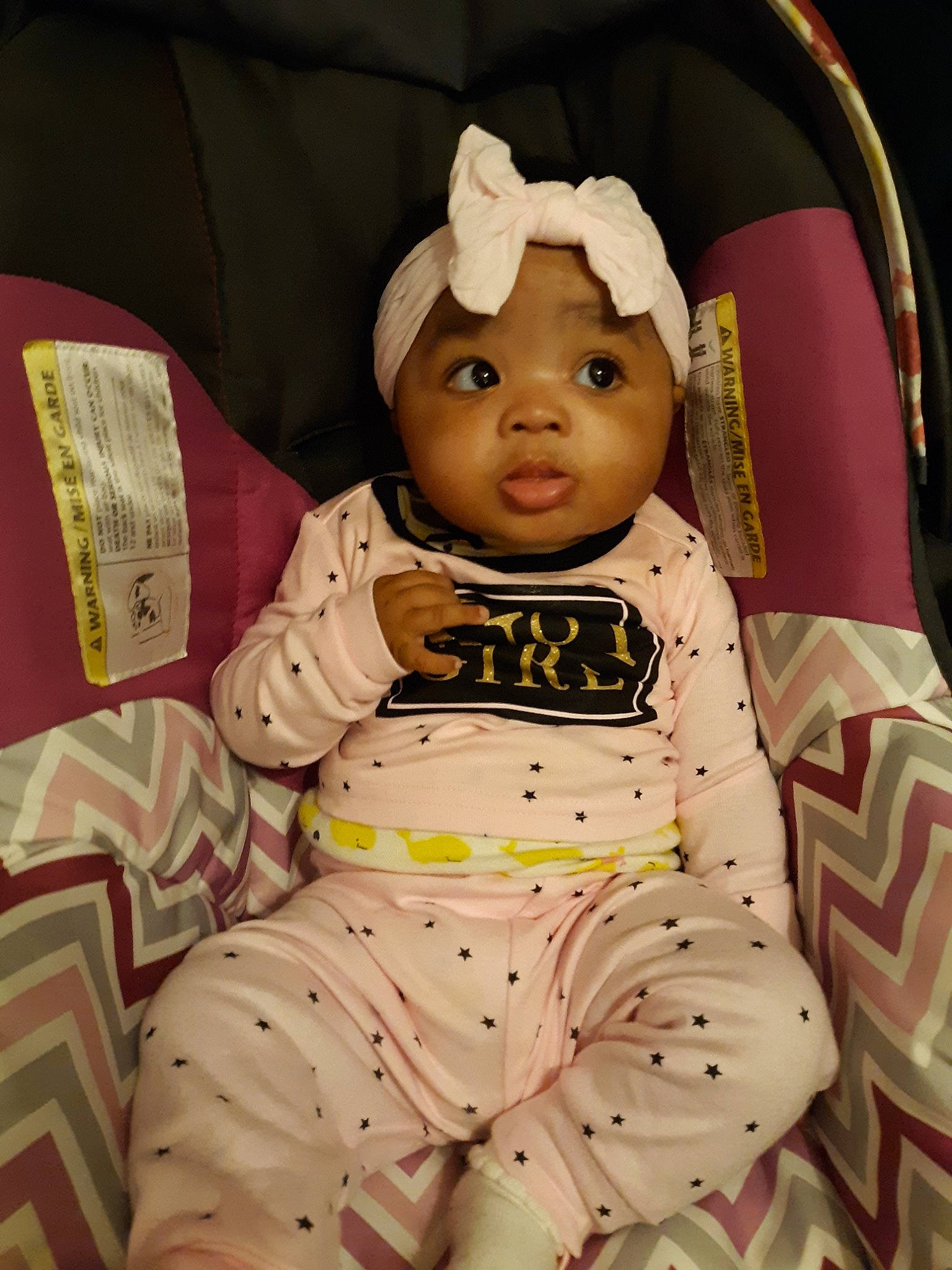 Irie is registered to the contest to win money with this photo: baby, cheek, child, ear, eye, head, headwear, person, pink, skin, smile, toddler