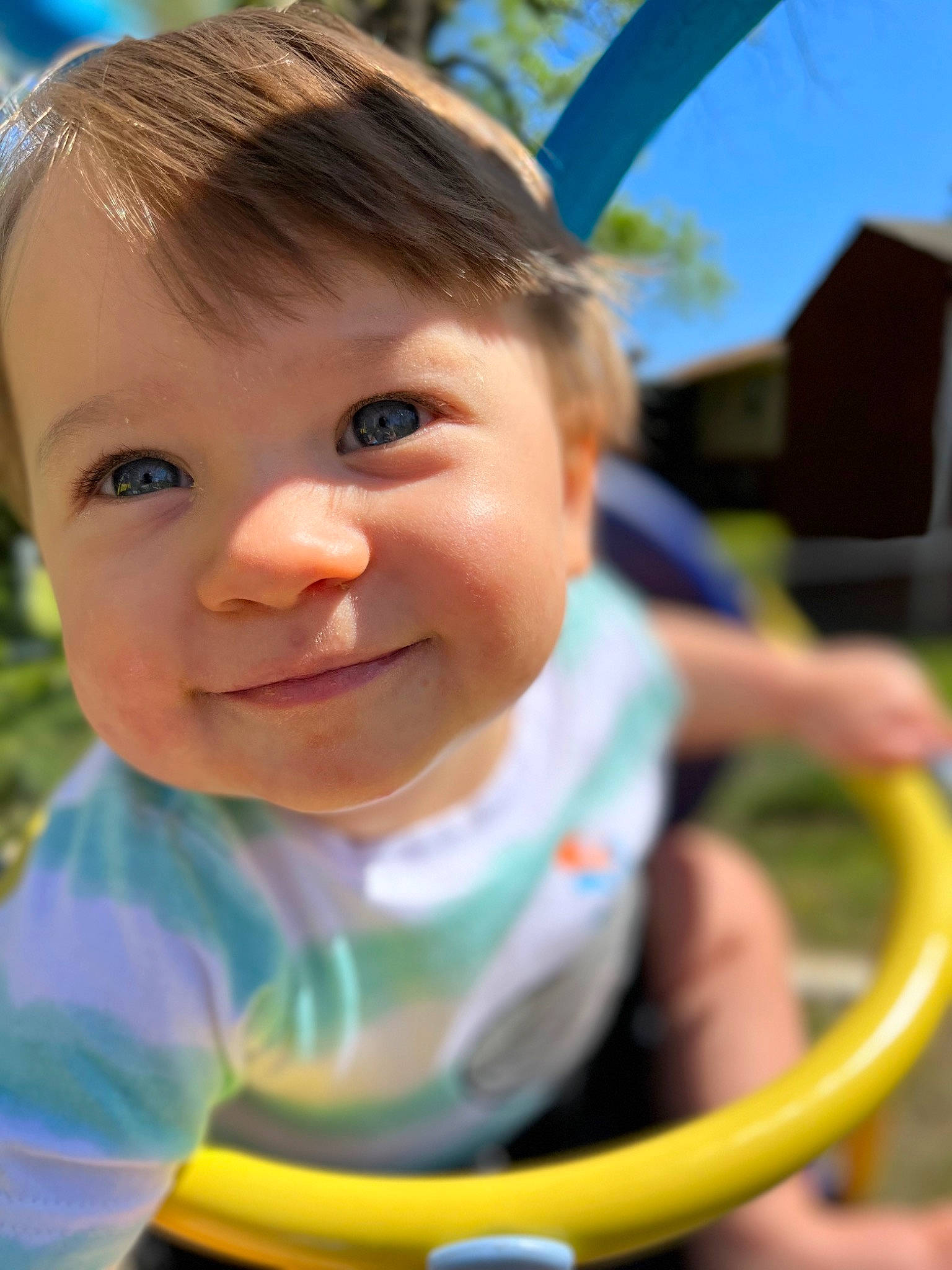 Spencer joined the competition — help win amazing prizes! baby, baby_toddler_clothing, blue, cheek, chin, eyelash, face, facial_expression, finger, fun, grass, happy, iris, joy, leisure, light, nose, person, public_space, skin