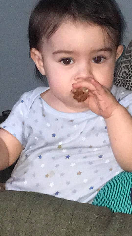 Keziah joined the competition — help win amazing prizes! baby, cheek, child, chin, eating, face, head, lip, mouth, neck, nose, person, toddler