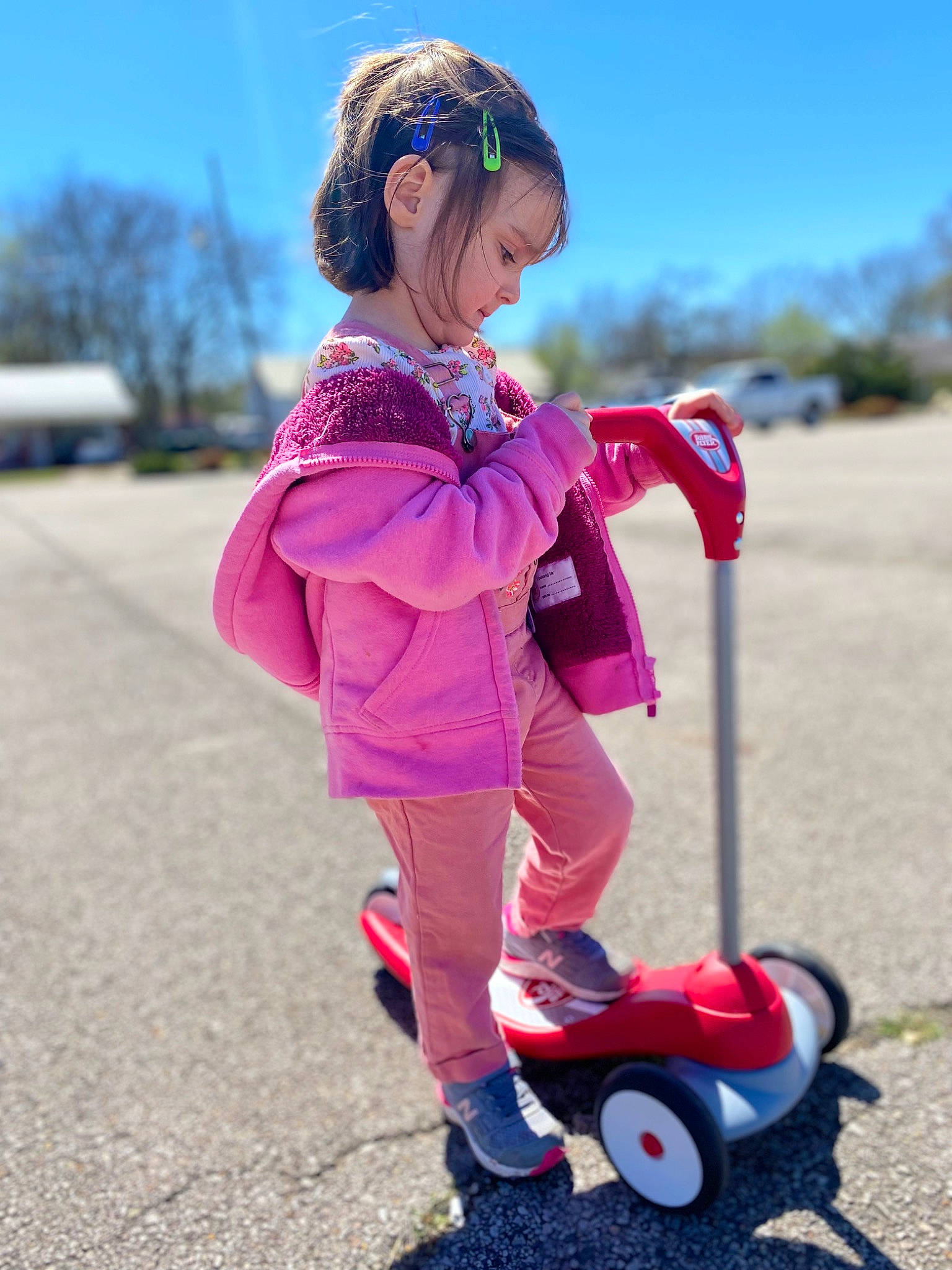Ava joined the competition — help win amazing prizes! child, electric_blue, fun, grass, happy, helmet, kick_scooter, leisure, magenta, person, recreation, riding_toy, rolling, shoe, sky, sneakers, tire, toddler, toy, tree