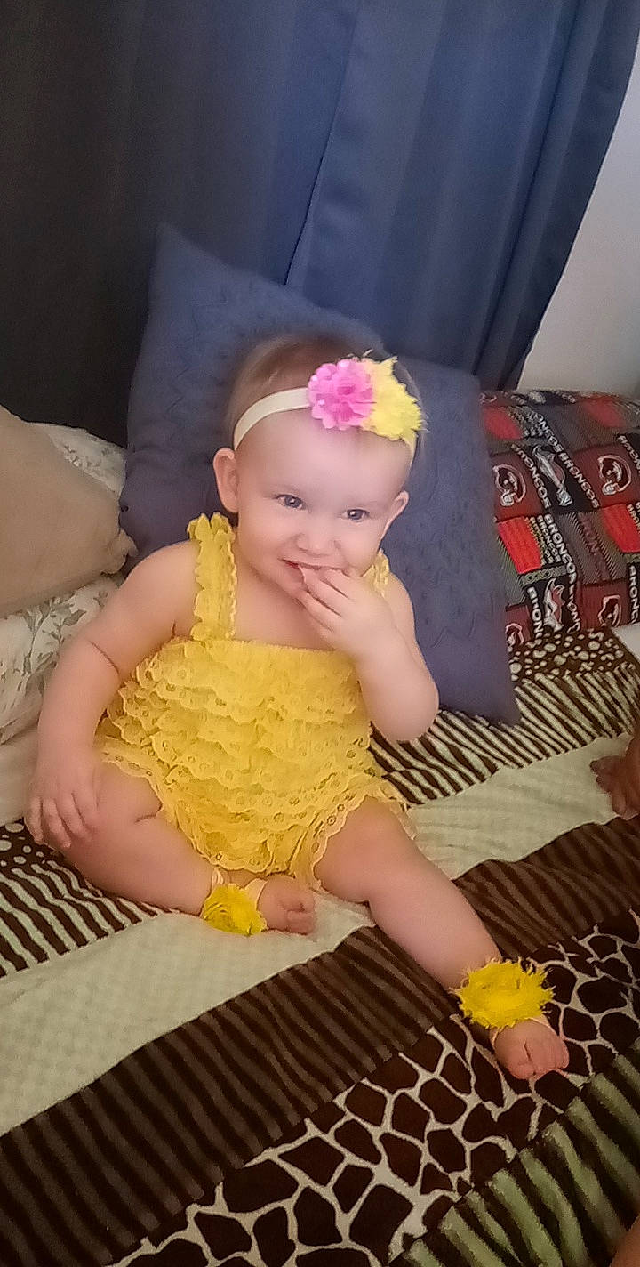 Kaleya joined the competition — help win amazing prizes! baby, baby_products, baby_toddler_clothing, cheek, child, dress, eye, finger, happy, headband, headpiece, headwear, iris, joy, magenta, nail, pattern, person, pink, skin