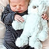 Carson joined the competition — help win amazing prizes! baby, sleeping, striped_pajamas, teddy_bear, plush_toy, cushion, soft_fabric, infant, child, cozy, cute, peaceful, resting, hand, face, closed_eyes, comfort, indoor, portrait, newborn