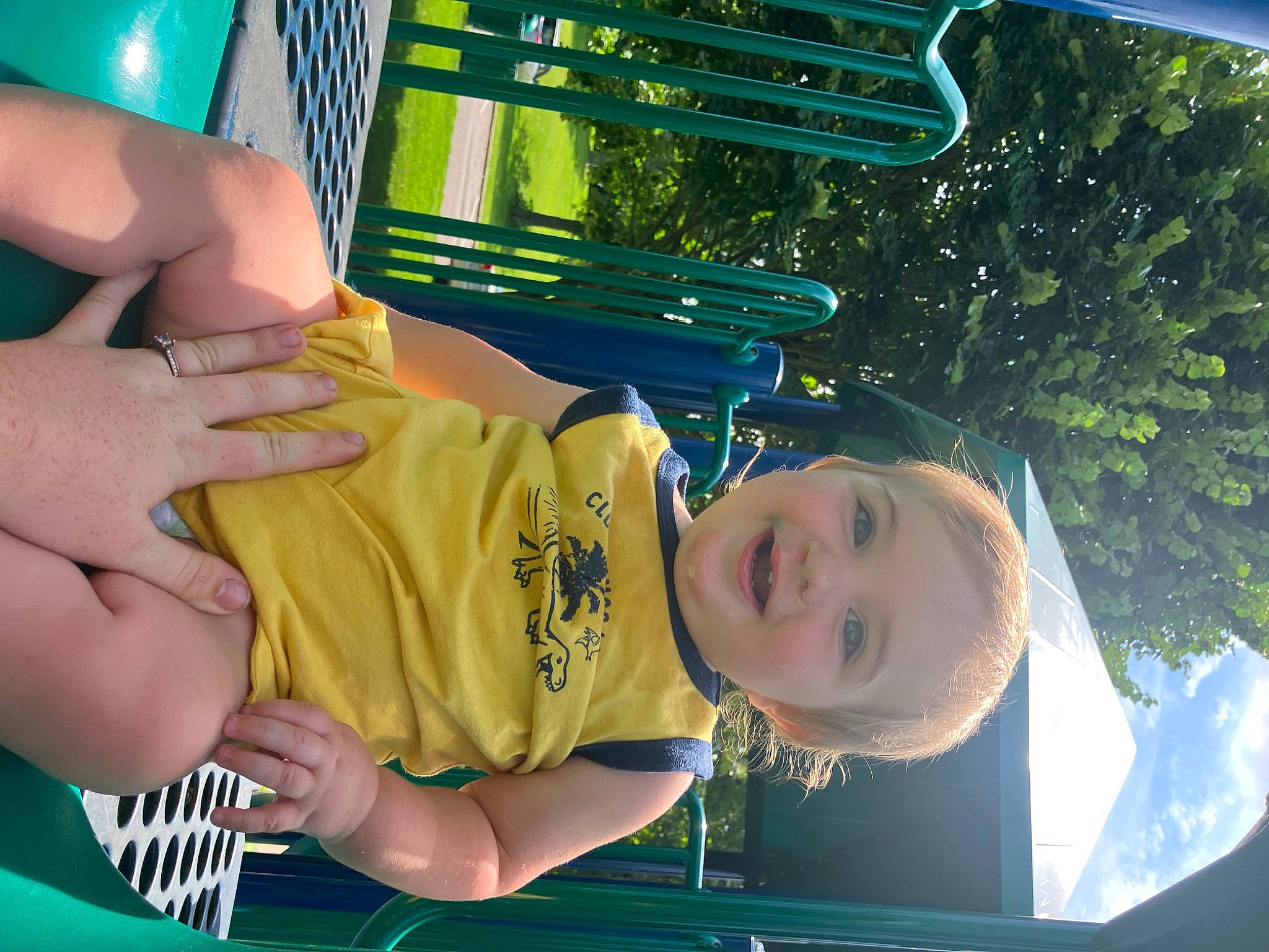 Braxten is registered to the contest to win money with this photo: arm, child, elbow, electric_blue, fun, gesture, grass, happy, human_leg, joy, leisure, person, play, recreation, smile, thigh, thumb, toddler, tree, vacation