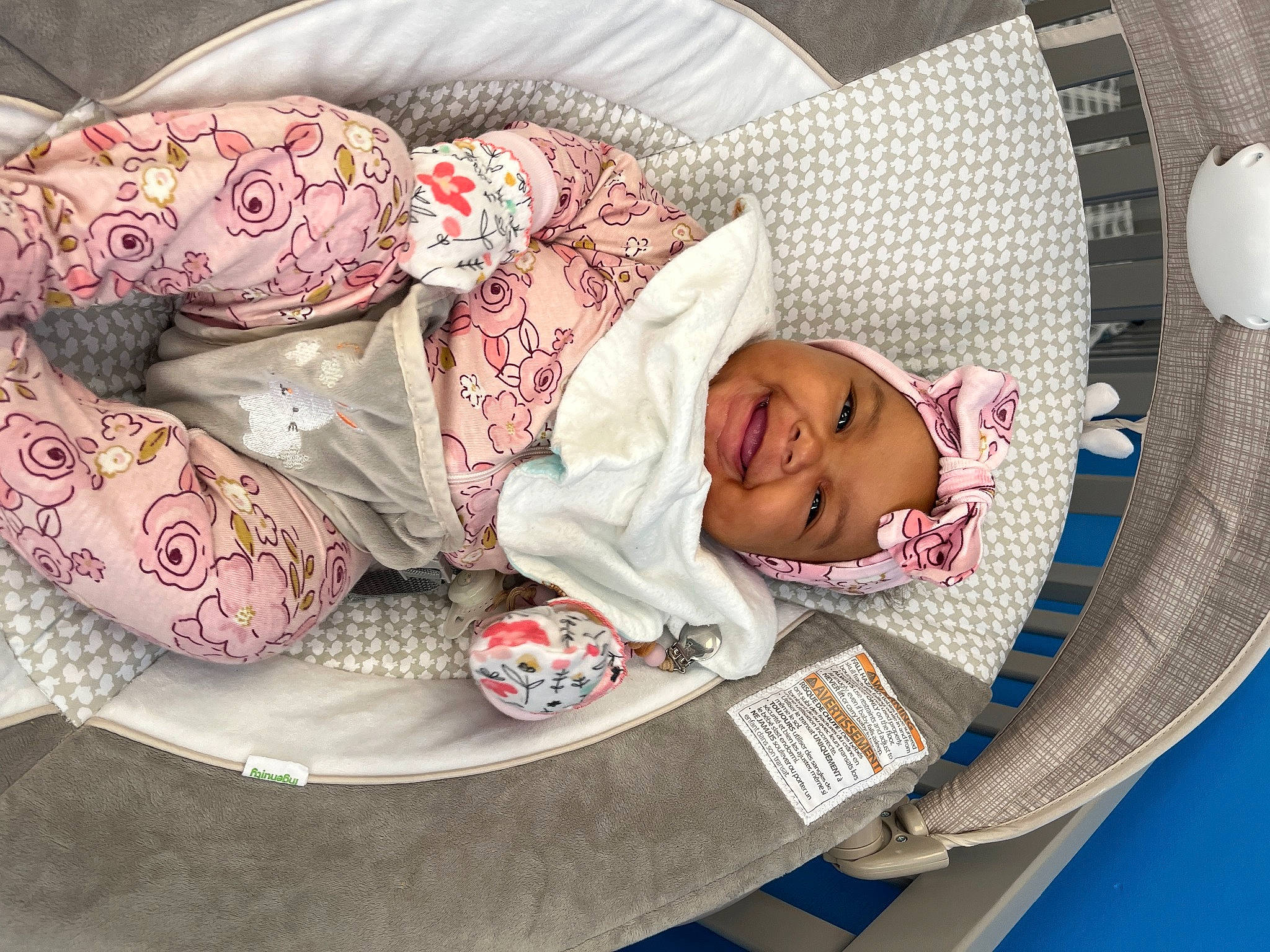 Mckayla is registered to the contest to win money with this photo: baby, baby_products, baby_toddler_clothing, carmine, child, circle, comfort, dishware, fashion_accessory, headgear, headwear, joy, linens, nap, pattern, person, room, rose, serveware, sleep