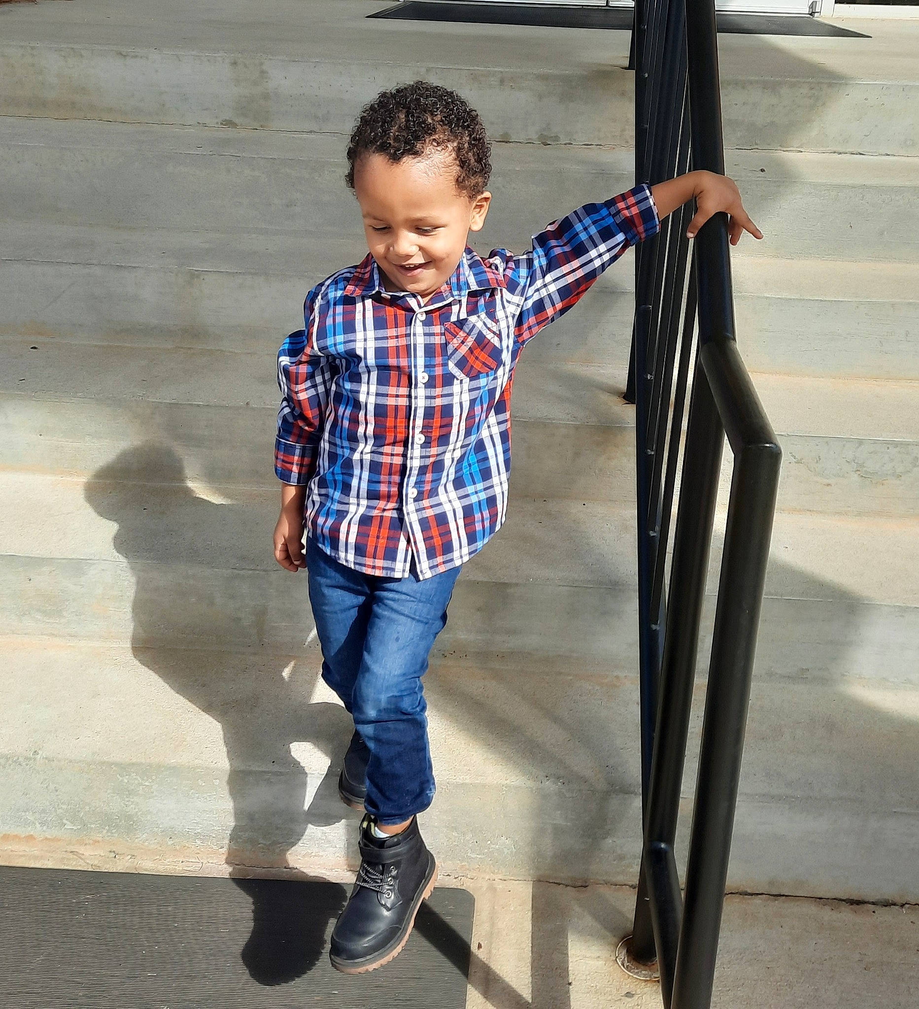 Kobe joined the competition — help win amazing prizes! boot, cool, denim, dress_shirt, electric_blue, gesture, happy, human_leg, jeans, joy, knee, leg, leisure, pattern, person, plaid, sleeve, t_shirt, tartan, toddler