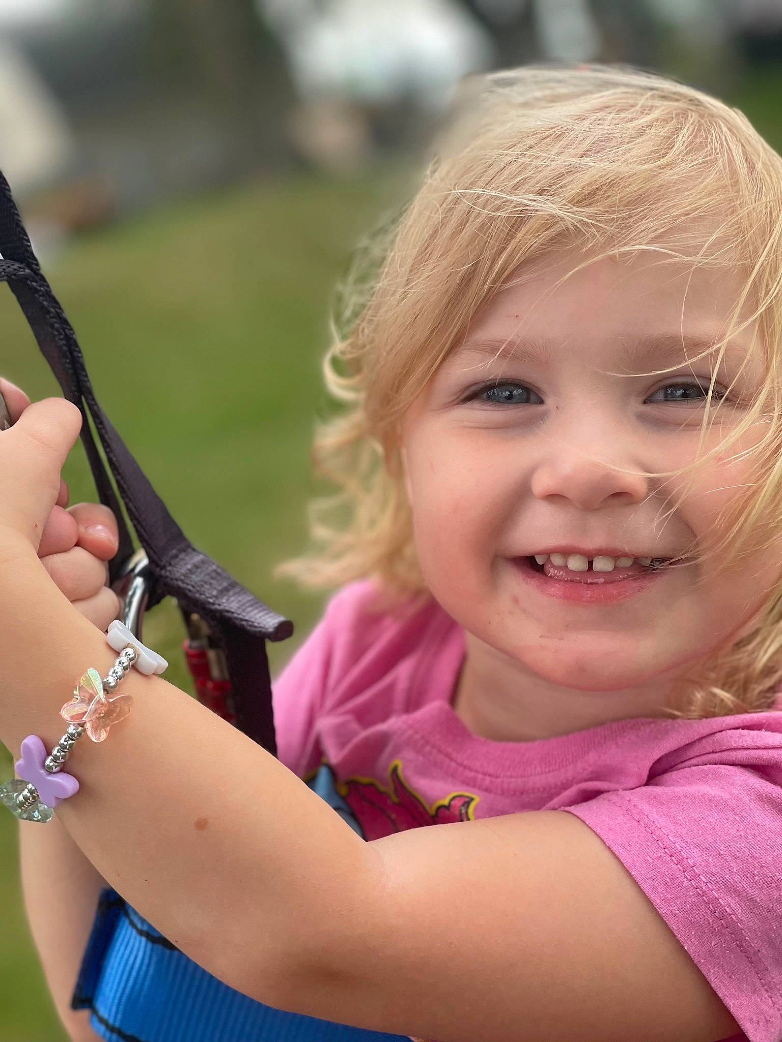 Isla joined the competition — help win amazing prizes! arm, blond, elbow, finger, fishing_reel, fishing_rod, fun, gesture, grass, hair, hand, happy, human, joy, leisure, people_in_nature, person, recreation, smile, thumb